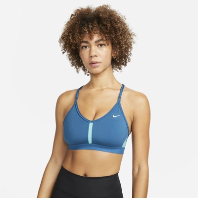 Shop Nike Women's Indy Light-support Padded V-neck Sports Bra In Blue