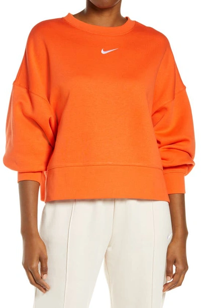 Shop Nike Sportswear Essential Oversize Sweatshirt In Orange/ White
