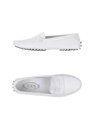 Shop Tod's Moccasins In White