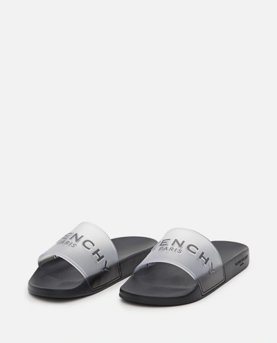 Shop Givenchy Slide Flat Rubber Sandals In White