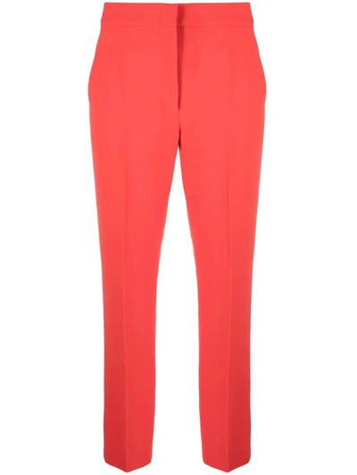 Shop Moschino Tailored Cropped Trousers In Red