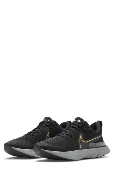 Shop Nike React Infinity Run Flyknit 2 Running Shoe In Black/ Gold