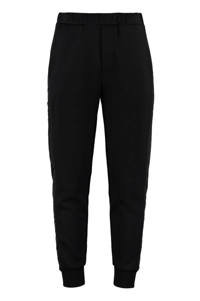 Shop Prada Track-pants With Decorative Stripes In Black