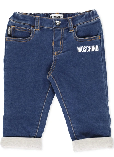 Shop Moschino Loged Jeans In Dark Indigo
