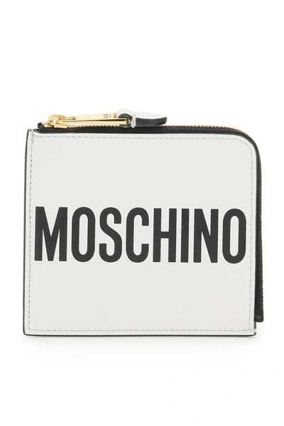 Shop Moschino Logo Print Zipped Wallet In White