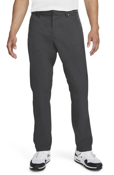 Shop Nike Dri-fit Repel Water Repellent Slim Fit Golf Pants In Dark Smoke Grey