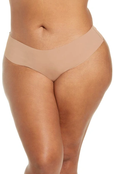 Shop Skims Naked Dipped Thong In Sienna