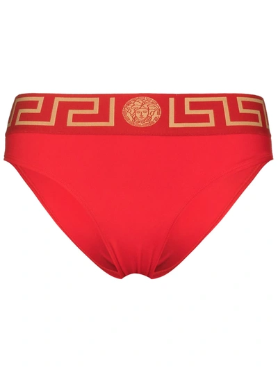 Shop Versace Greca Border Bikini Bottoms In Rot