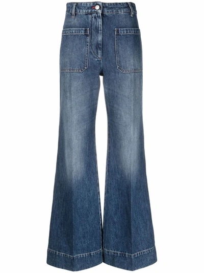 Shop Victoria Beckham Alina Faded Flared Jeans In Blau