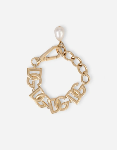 Shop Dolce & Gabbana Link Bracelet With Dg Multi-logo In Gold