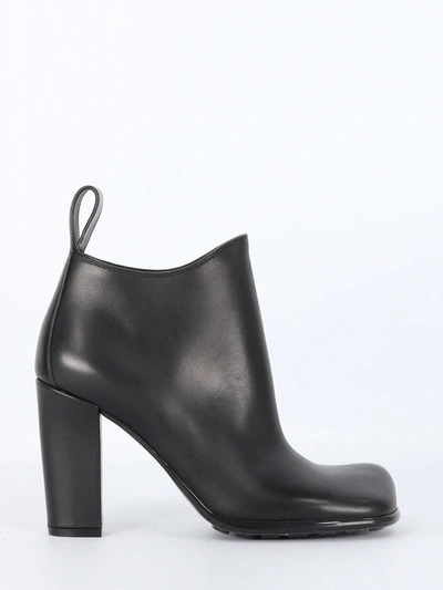 Shop Bottega Veneta Storm Leather Black Ankle Boots