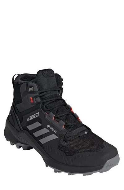 Shop Adidas Originals Terrex Swift R3 Mid Waterproof Hiking Boot In Black/ Grey / Solar Red