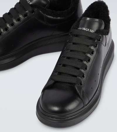Shop Alexander Mcqueen Oversized Leather Sneakers In Black/black