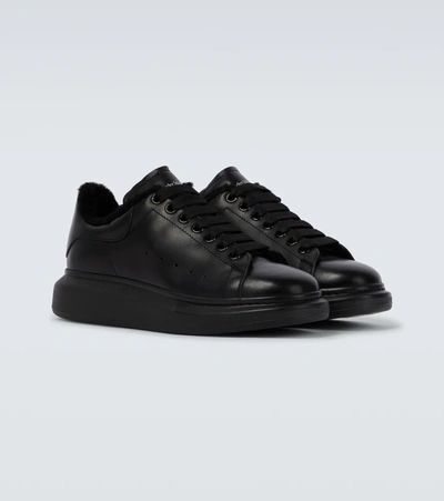 Shop Alexander Mcqueen Oversized Leather Sneakers In Black/black