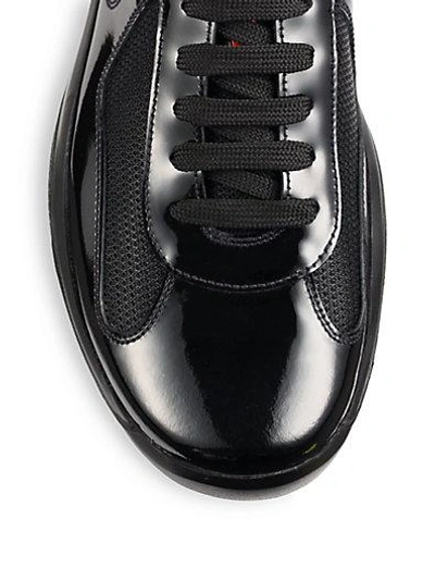 Shop Prada Patent Leather Sneakers In Black
