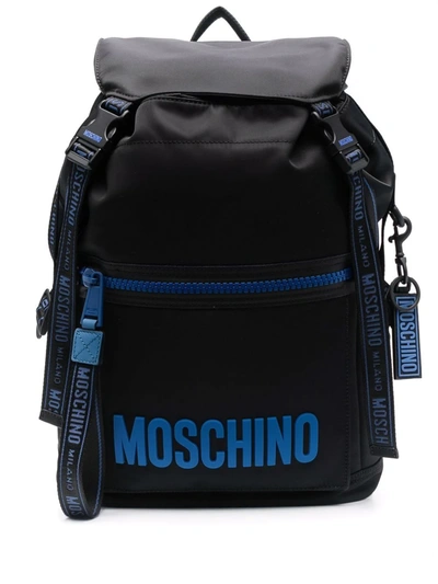 Shop Moschino Embossed-logo Backpack In Black