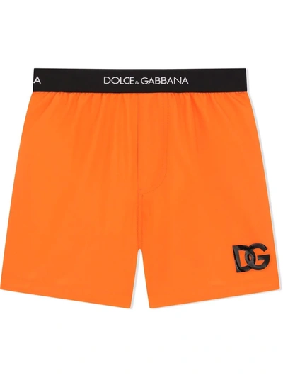 Shop Dolce & Gabbana Embroidered Logo Swim Shorts In Orange