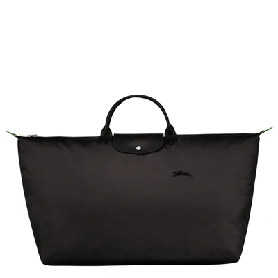 Shop Longchamp Travel Bag M Le Pliage Green In Black