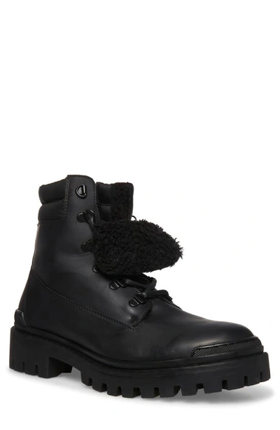 Shop Steve Madden Storms Water Resistant Boot In Black