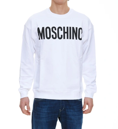 Shop Moschino Logo Printed Crewneck Sweatshirt In White