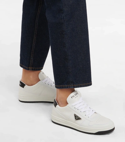 Prada Logo-plaque Leather Sneakers In Bianco+nero