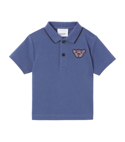 Shop Burberry Kids Thomas Bear Polo Shirt (6-12 Months) In Blue