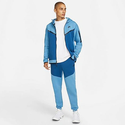 Shop Nike Tech Fleece Taped Jogger Pants In Blue