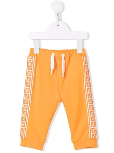 Shop Fendi Ff-stripe Track Pants In Orange