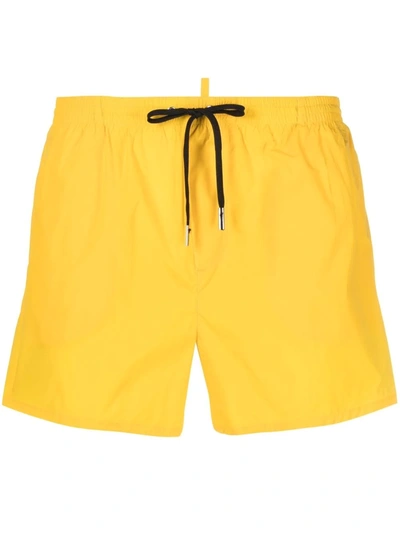 Shop Dsquared2 Icon-print Drawstring Swim Shorts In Yellow