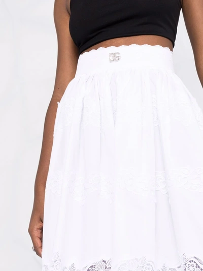 Shop Dolce & Gabbana Floral Lace Flared Midi Skirt In White