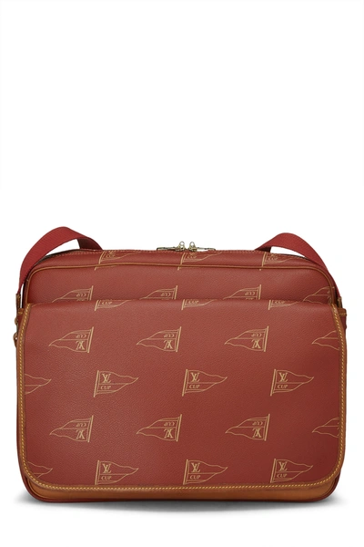 At Auction: Louis Vuitton, LOUIS VUITTON CALVI RED COATED CANVAS CROSSBODY