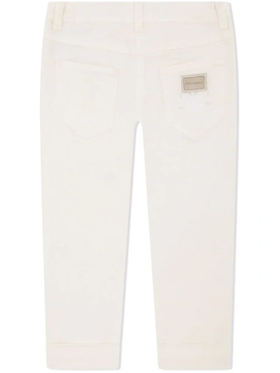 Shop Dolce & Gabbana Embroidered Slim-cut Jeans In White