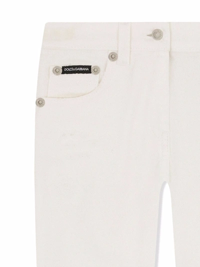 Shop Dolce & Gabbana Embroidered Slim-cut Jeans In White