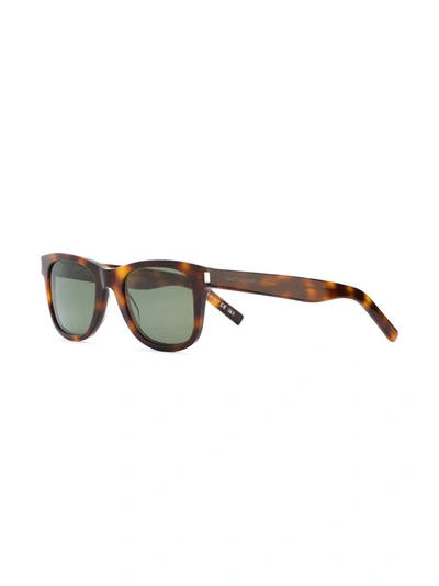 Shop Saint Laurent Rectangular Frame Sunglasses In Brown