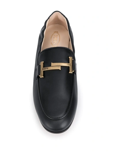 Shop Tod's T Logo Loafers In Black