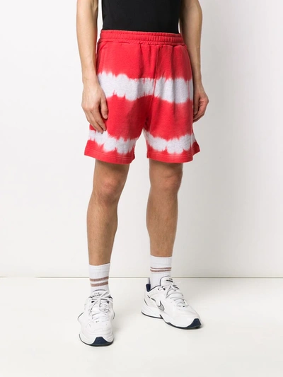 Shop Msgm Tie-dye Track Shorts In Red