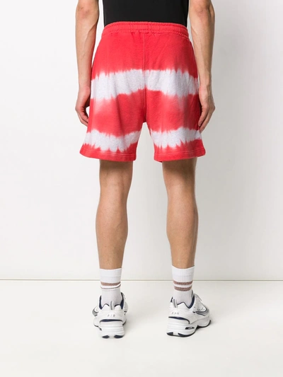 Shop Msgm Tie-dye Track Shorts In Red