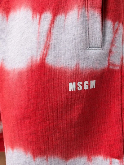 Shop Msgm Tie-dye Track Shorts In Red