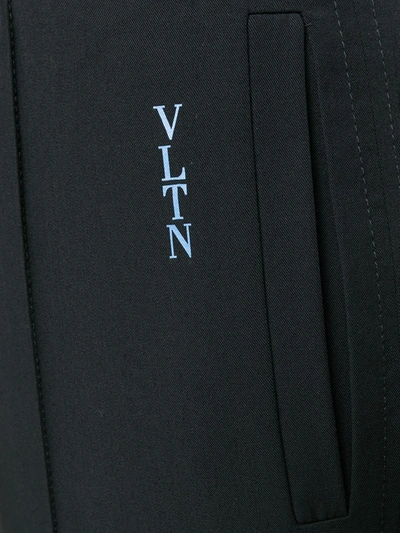 Shop Valentino Logo-print Straight Leg Trousers In Black