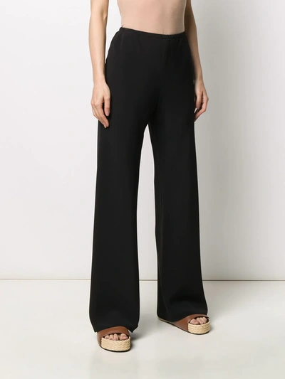Shop The Row Crepe Wide-leg Trousers In Black