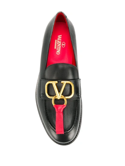 Shop Valentino Vring Loafers In Black