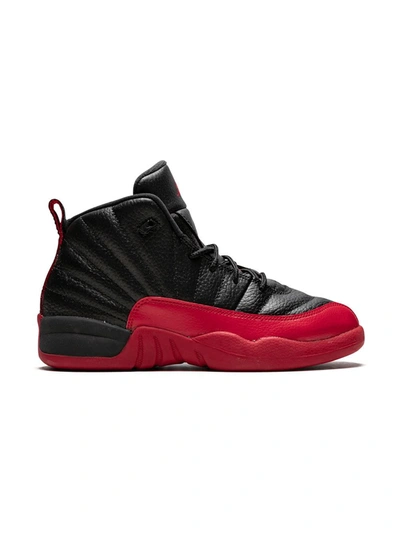 Shop Jordan 12 Retro Sneakers In Black