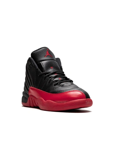 Shop Jordan 12 Retro Sneakers In Black