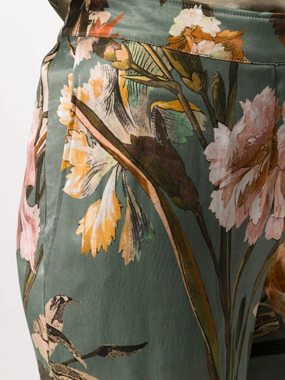 Shop Off-white Floral Print Flared Trousers In Green