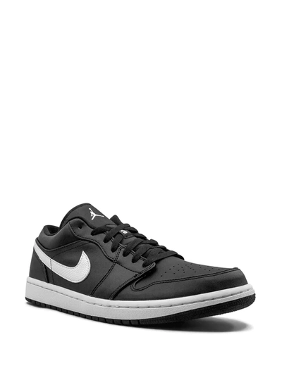 Shop Jordan Air  1 Low "black/white" Sneakers