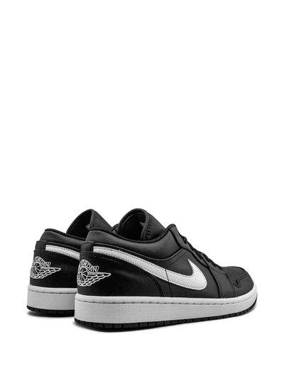 Shop Jordan Air  1 Low "black/white" Sneakers