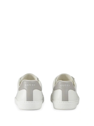 Shop Gucci Perforated Logo Sneakers In White