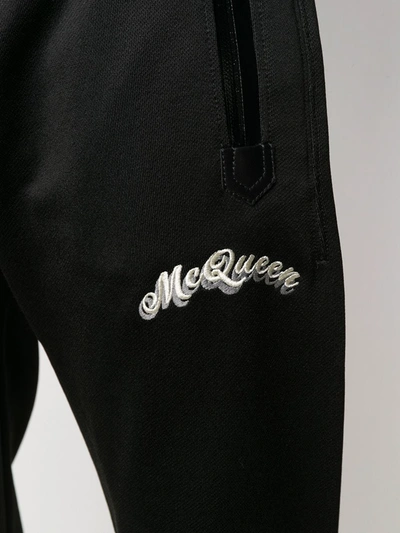 Shop Alexander Mcqueen Cotton-blend Logo Sweatpants In Black