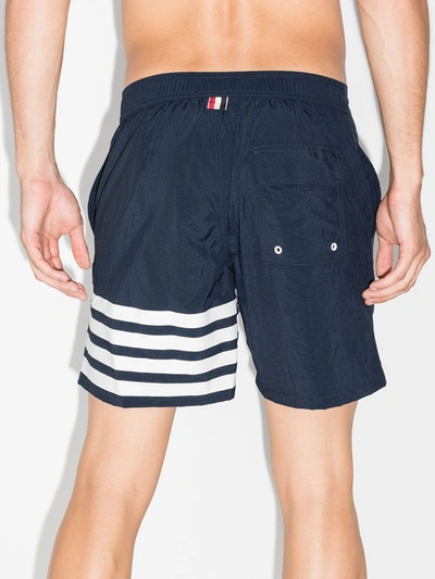 Shop Thom Browne 4-bar Solid Tech Swim Short In Blue