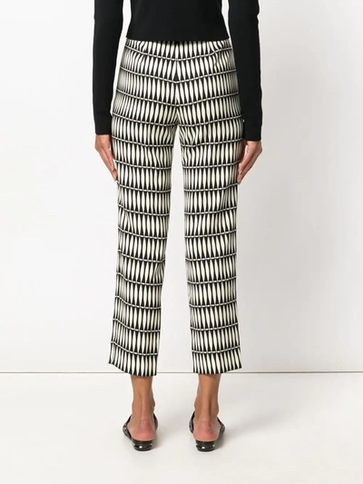Shop Lanvin Printed Trousers In Black